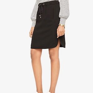 Tan LOFT drawstring skirt.